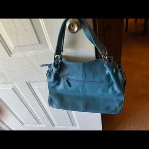 Blue shoulder bag never